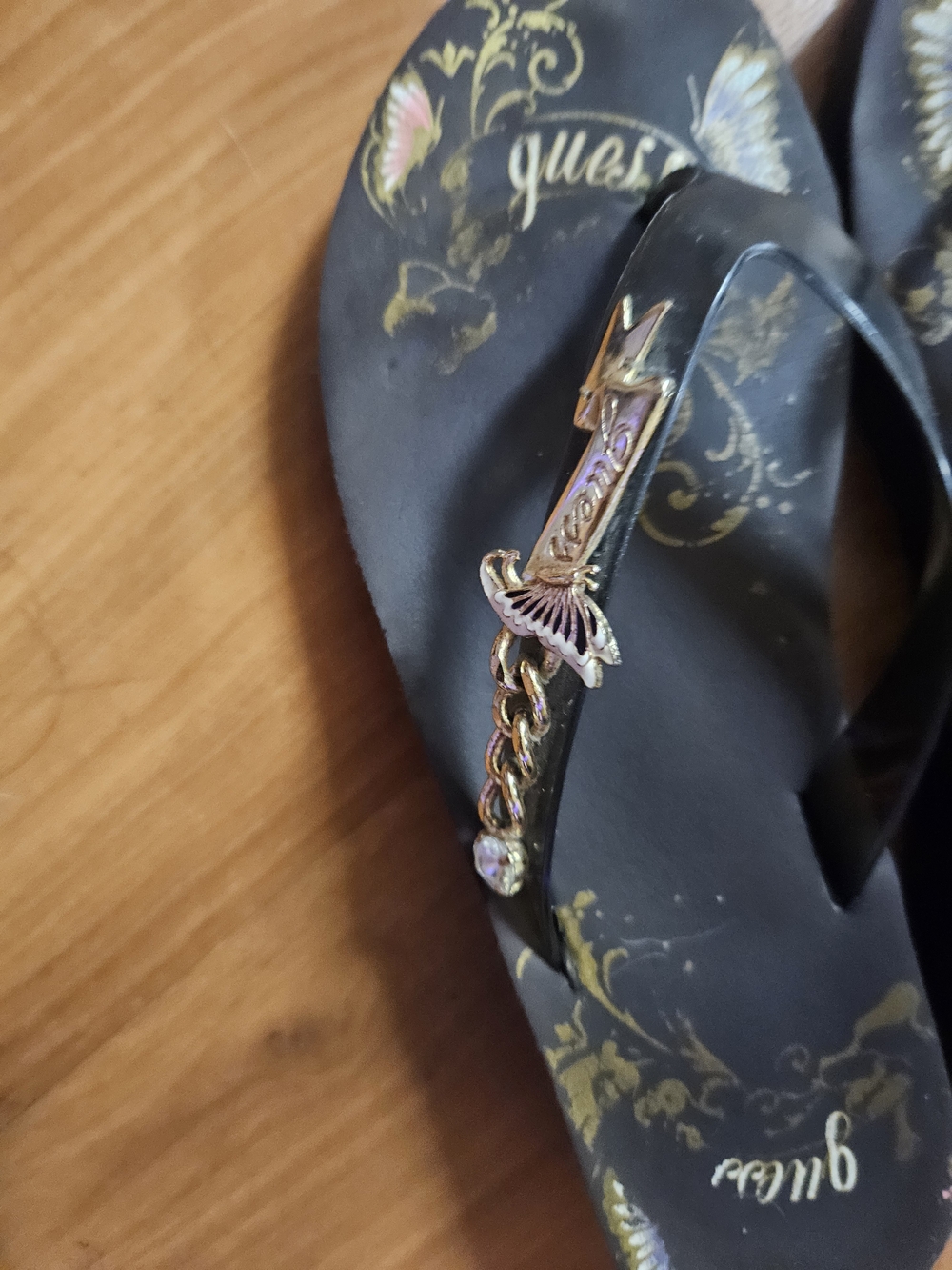 Guess Black Flip Flops with Gold Accent Hardware